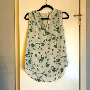 White and olive floral print sleevless blouse